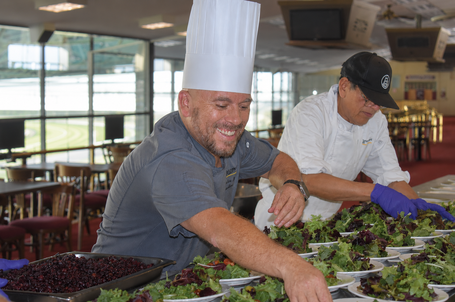 Chef Nava and culinary team preparing fresh dishes for service